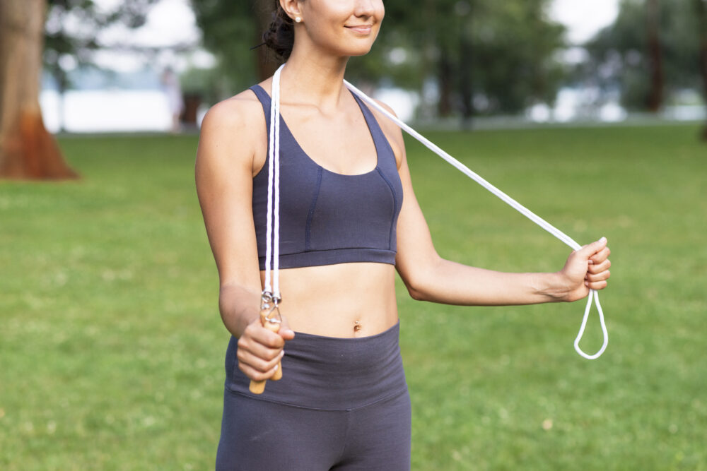close up woman with jumping rope